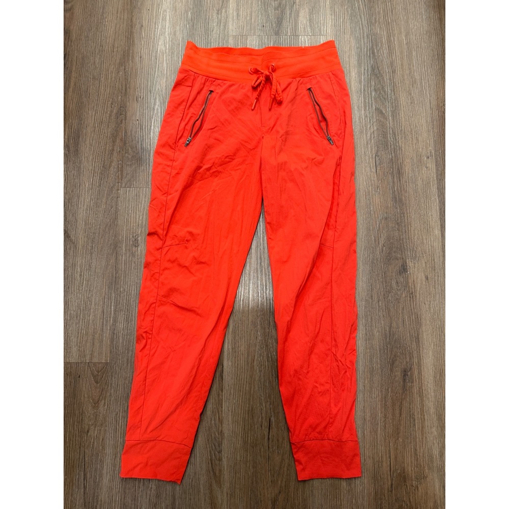 Athleta Trekkie North Jogger Orange Hiking Pants Womens 2 Zipper Pockets Stretch